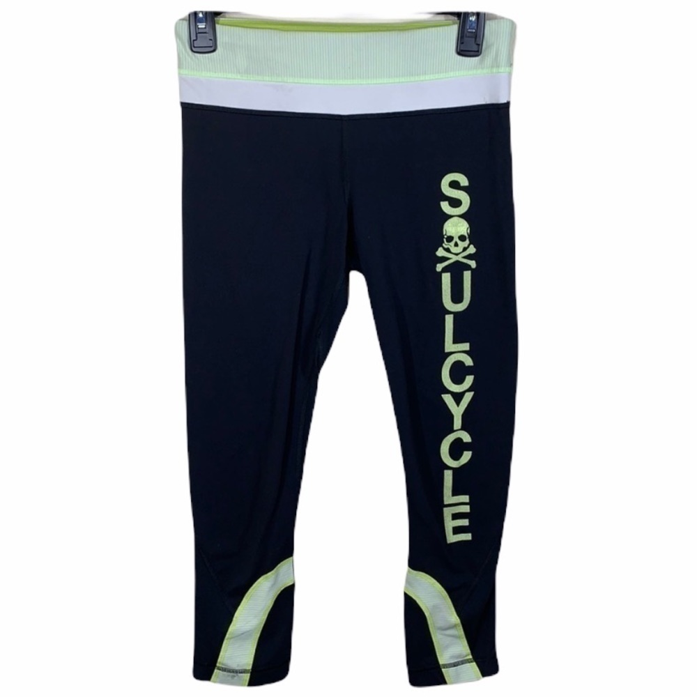 Lululemon black and yellow skull soul cycle crops